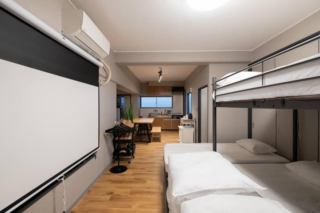 Tasoneurbanstayosaka なんば日本橋南不夜城705 Appartement